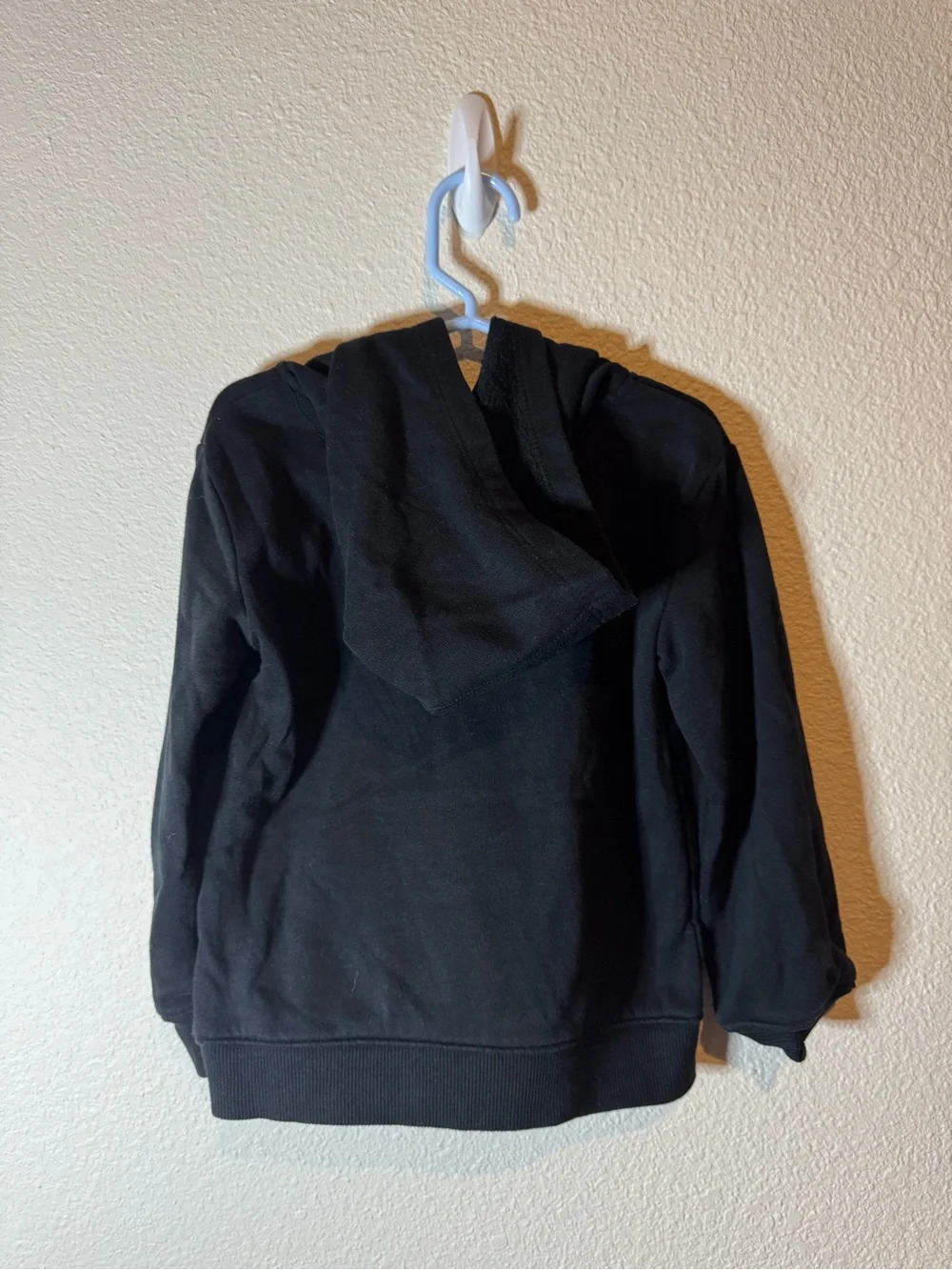 Kids Under Armour Black Hoodie with Blue Logo